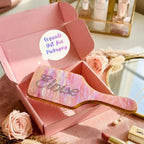 Rhinestone air cushion hair brush in a gift box with pink marbled cushion and wooden handle
